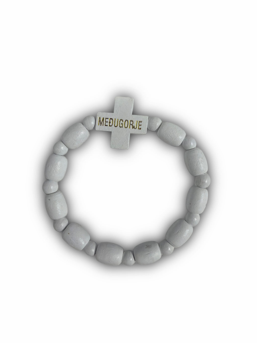 Beaded bracelet with a cross charm on a white background