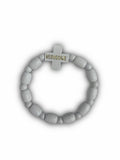 Beaded bracelet with a cross charm on a white background